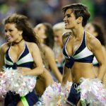 Seattle Seahawks Sea Gals cheerleaders dance during an NFL football game between the Seahawks and San Francisco 49ers in the second half of an NFL football game, Sunday, Sept. 15, 2013, in Seattle. (AP Photo/Elaine Thompson)