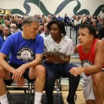 Governor Inslee and Dori exchange words before The Clash on the Court at Shorecrest High School Wednesday night.