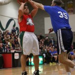 Gov. Inslee, 35, tries to block Dori's shot at The Clash on the Court at Shorecrest High School Wednesday night. Check out the vertical!