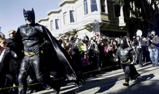 Miles Scott, dressed as Batkid, prepares to save a damsel in distress during his day as city offici...