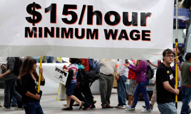 Will the $15 minimum wage in SeaTac be a useful experiment. (AP Photo/file)...