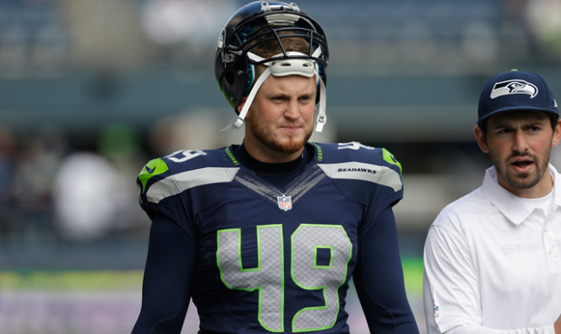 Seattle Seahawks’ Clint Gresham stands on the sidelines before an NFL football game agains th...