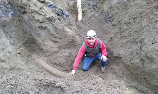 Transit Plumbing Inc employee Joe Wells found the mammoth tusk Tuesday while excavating on a projec...