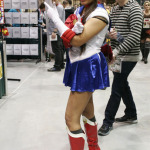 A woman dressed as Sailor Moon pauses to take a picture at Emerald City Comicon at the Washington State Convention Center in Seattle, on Saturday, March 29, 2014.