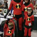 A family dressed as The Incredibles pause to take a photo at Emerald City Comicon at the Washington State Convention Center in Seattle, on Saturday, March 29, 2014.