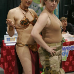 Two women dress up and pose for photos at Emerald City Comicon at the Washington State Convention Center in Seattle, on Saturday, March 29, 2014.