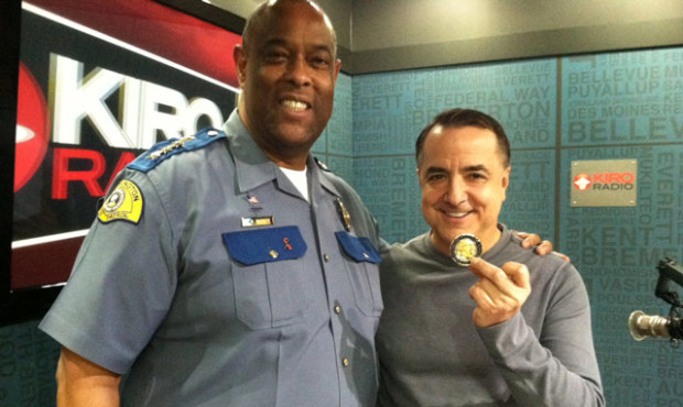 Washington State Patrol Chief John R. Batiste awarded Dori Monson with a chief’s coin for rep...