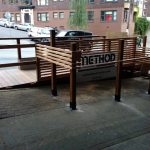 The Montana Bar on Capitol Hill features a parklet. Seattle’s parklet program converts parking spaces into park space. According to RethinkX, driverless cars will cause a "land bonanza" to convert soon-to-be parking spaces into usable features. (File photo)