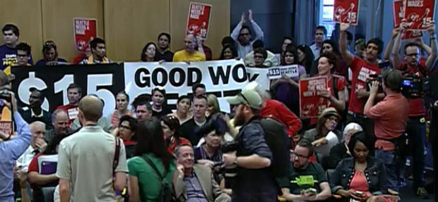 The Seattle City Council has approved an ordinance to phase in a $15 hourly minimum wage, the highe...