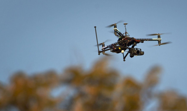 KIRO Radio host Tom Tangney says drones create the ultimate peeping Tom situation. (AP Photo/Ben Cu...