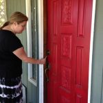 An Orting woman shows damage to house her done during a break in.