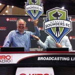 The Tom & Curley Show broadcasts live from CenturyLink Field Events Center before a viewing party of the US vs. Belgium World Cup match, Tuesday, July 1, 2014. 