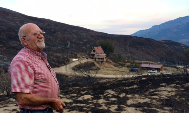Dale Burnison, 75, cannot believe that his homestead is still standing after the Carlton Complex fi...