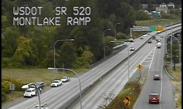 A couple of drivers Thursday tried to cruise over a grassy hill to bypass a crash on a 520 bridge r...