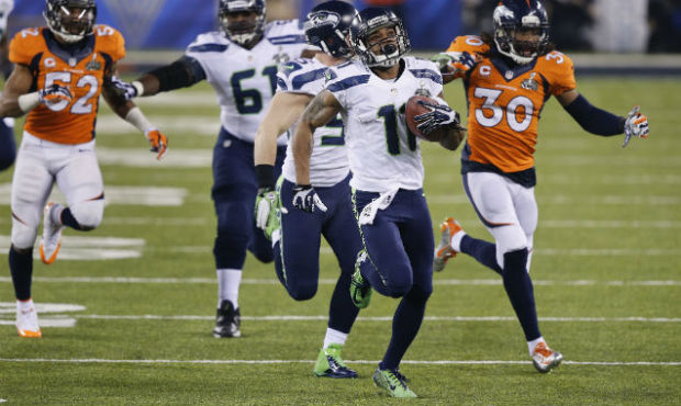 Percy Harvin returns a kickoff for a touchdown in Super Bowl XLVIII against the Broncos. (AP)...
