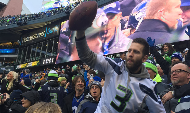 Scott Shelton, the man who caught the football Jermaine Kearse threw into the stands following his ...