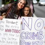 Parents and kids protest the use of crumb rubber material to replace the Edmonds School District's sports field.