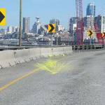 Paint in milk jugs was thrown onto the Alaskan Way Viaduct Thursday morning. 