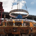 Aug. 24, 2015 After reassembling Bertha and wrapping up repairs earlier in the month, crews lower Bertha's front end back into the pit. The rest of the machine's major components are safely lowered into the pit by Sept. 8. The ensuing weeks are focused on welding the pieces back together.