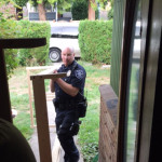 Seattle officer Jeremy Wade hauls in a bed frame over the weekend as he, officer Ryan Gallagher, and a group of volunteers dropped off beds to children without a comfy place to rest their heads at night. 