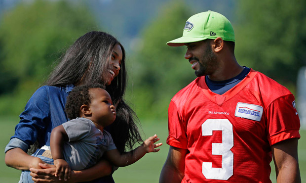 Does Russell Wilson have a “dad bod?” (AP)...