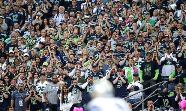 Seattle Seahawks fans yell during a Detroit Lions possession in the first half of an NFL football g...