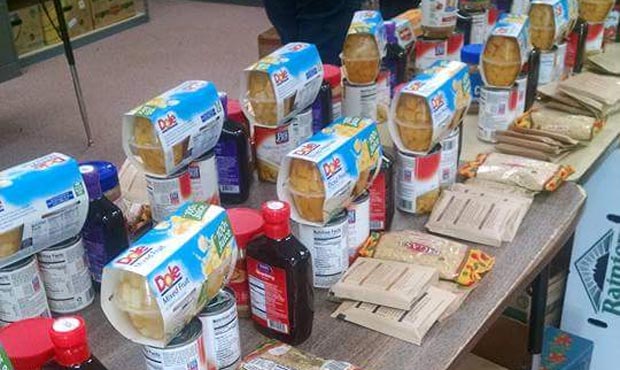 This is one line of food that Kitsap Food Backpacks 4 Kids has handed out during a recent food driv...