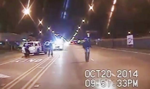 In this Oct. 20, 2014 frame from dash-cam video provided by the Chicago Police Department, Laquan M...