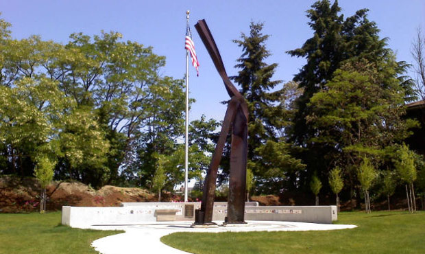 A 9/11 memorial stands in Bremerton, Wash. using twisted remnants of the twin towers, similar to wh...