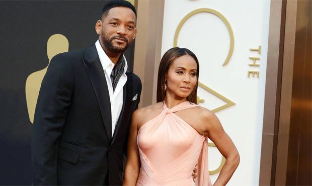 Will Smith, left, and Jada Pinkett Smith attended the Oscars in March of 2015, but have said they a...