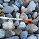 A 3-year-old girl picked up this syringe while standing on a Seattle sidewalk near Seattle Center. (MyNorthwest)