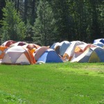 Evacuees set up a tent city while fleeing the flames of a zero-percent contained wildfire in Central Washington on Tuesday, August 14, 2012. The fast-moving Taylor Bridge Fire has burned at least 26,000 acres since it broke out east of Cle Elum Monday, August 13, 2012.