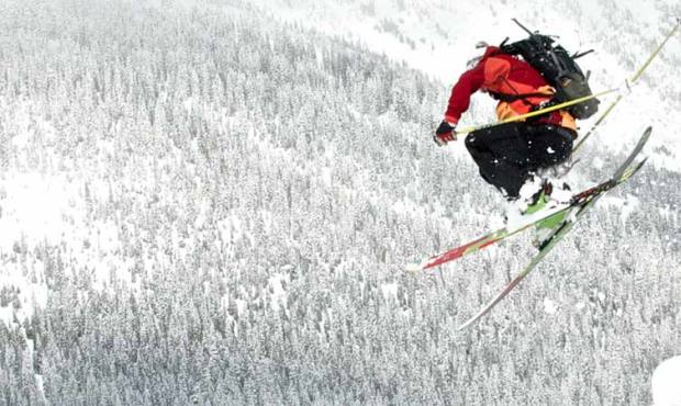 A skier takes the leap at Stevens Pass, which opens Tuesday thanks to a dumping of heavy snow in th...