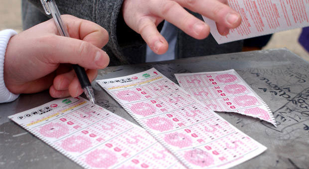 The Powerball jackpot has grown to a record $425 million, prompting many to form office pools to in...