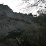 A landslide on Whidbey Island has destroyed one home and threatens several others.