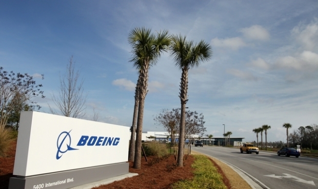 With lovely palm trees next to a Boeing Corporation sign, this can’t be the Puget Sound area....