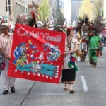 Protesters march through downtown Seattle to get to the Federal Building on May Day 2013.