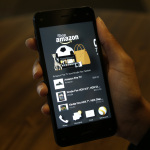 The app that links to shopping on Amazon.com is shown on the new Amazon Fire Phone, Wednesday, June 18, 2014, in Seattle. (AP Photo/Ted S. Warren)