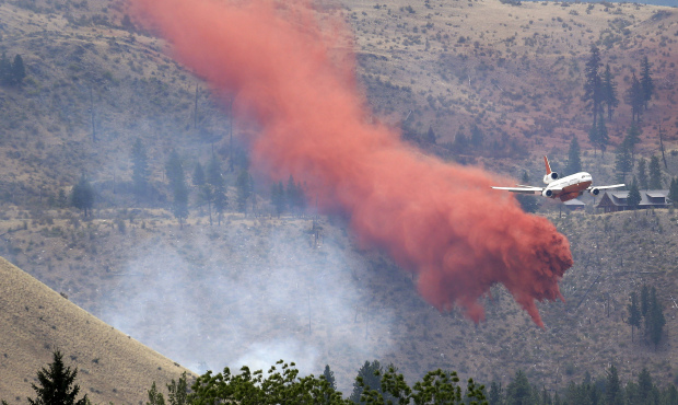 The largest wildfire burning in central Washington are over four times larger than the size of Seat...