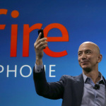 Amazon CEO Jeff Bezos introduces the new Amazon Fire Phone, Wednesday, June 18, 2014, in Seattle. (AP Photo/Ted S. Warren)