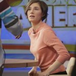 Amanda Knox prepares to leave the set following a television interview, Friday, Jan. 31, 2014 in New York. Knox said she will fight the reinstated guilty verdict against her and ex-boyfriend Raffaele Sollecito in the 2007 slaying of a British roommate in Italy and vowed to "never go willingly" to face her fate in that country's judicial system . "I'm going to fight this to the very end," she said in an interview with Robin Roberts on ABC's "Good Morning America." (AP Photo/Mark Lennihan)