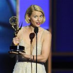  Claire Danes accepts the award for outstanding lead actress in a drama series for her role on "Homeland" as presenter Jimmy Fallon looks on at right at the 65th Primetime Emmy Awards at Nokia Theatre on Sunday Sept. 22, 2013, in Los Angeles. (Photo by Chris Pizzello/Invision/AP)