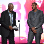Carmelo Anthony and Julius Erving present the award for best team at the ESPY Awards at the Nokia Theatre on Wednesday, July 16, 2014, in Los Angeles. (Photo by John Shearer/Invision/AP)