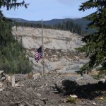 A $50-million settlement was announced between the state and victims of the deadly Oso landslide, the day before a jury was set to convene in trial. (AP)