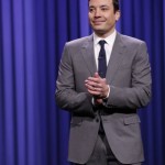  In this photo provided by NBC, Jimmy Fallon appears during his "The Tonight Show" debut on Monday, Feb. 17, 2014, in New York. Fallon departed from the network's "Late Night" on Feb. 7, 2014, after five years as host, and is now the host of "The Tonight Show," replacing Jay Leno after 22 years. (AP Photo/NBC, Lloyd Bishop)