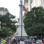 Protesters stand around a flying Confederate flag during a rally to take down the flag at the South Carolina Statehouse in Columbia, S.C. on Saturday, June 20, 2015. Rep. Doug Brannon, R-Landrum, said it's past time for the Confederate flag to be removed from South Carolina's Statehouse grounds after nine people were killed at the Emanuel A.M.E. Church shooting. (AP Photo/Rainier Ehrhardt)