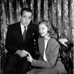 FILE - This May 1945 file photo shows actor Humphrey Bogart, left, with his wife actress Lauren Bacall. Bacall, the sultry-voiced actress and Humphrey Bogart's partner off and on the screen, died Tuesday, Aug. 12, 2014 in New York. She was 89. (AP Photo, File)