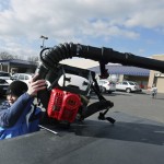 Phi Tran, of Bensalem, Pa., holds a blower that he bought in preparation for a snow storm predicted this weekend, Thursday, Jan.21, 2016, in Langhorne, Pa. The northern mid-Atlantic region, including Baltimore, Washington and Philadelphia, is preparing for a weekend snowstorm that is now forecast to reach blizzard conditions. 