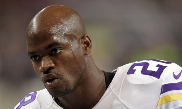 Minnesota Vikings running back Adrian Peterson warms up for an NFL football game. (AP Photo file)...